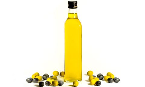Yellow, Bottle, Produce, Bottle cap, Glass bottle, Ingredient, Drinkware, Distilled beverage, Oil, Liqueur, 