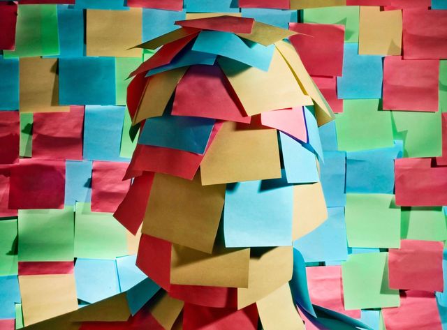 post-it notes on head