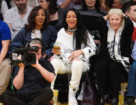 Rihanna sitting courtside at the Lakers basketball game in LA