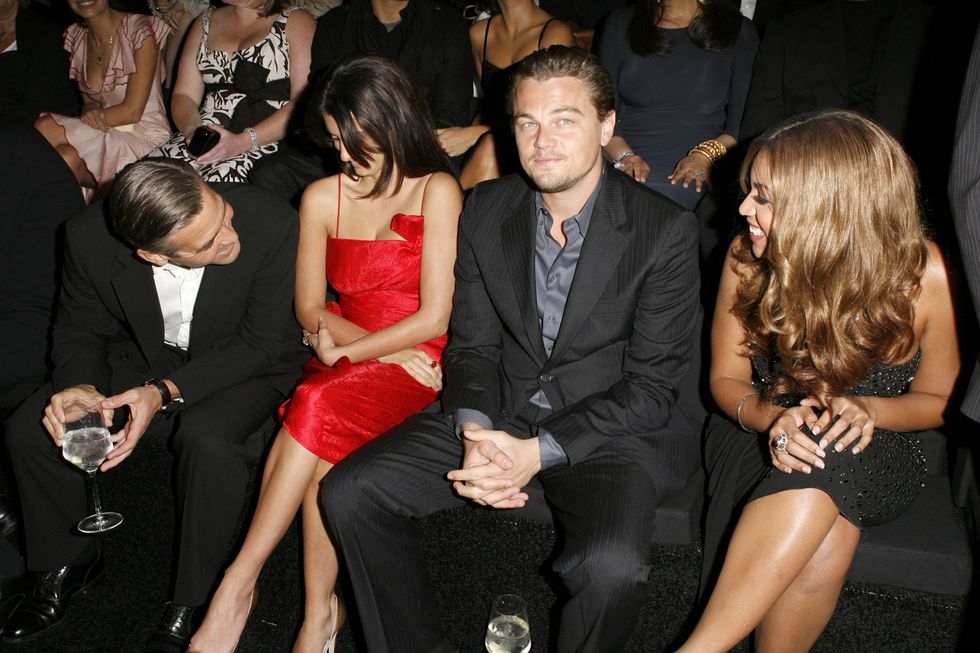 <p>George Clooney talks over two people to send his regards to Beyoncé during Giorgio Armani Privé<span class="redactor-invisible-space">'s L.A. show. (Leo still keeps his cool.)</span></p>