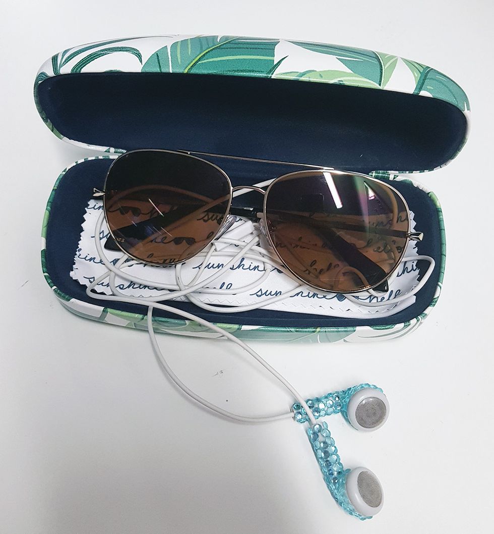 Packing earphones in sunglasses case hack