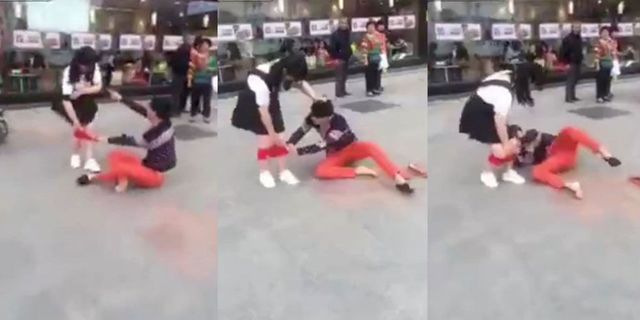 Man pulls down cheating girlfriend's pants in public