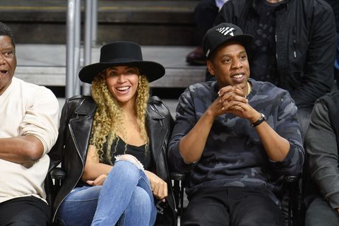 Beyonce and Jay Z at a basketball game