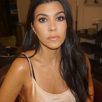 Kourtney Kardashian Has Ditched Her Signature Dark Hair for a Fiery Red Colored Bob