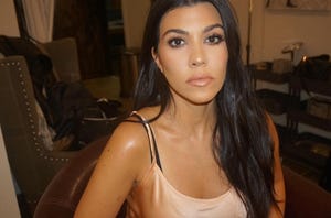 kourtney kardashian dyed hair red bob