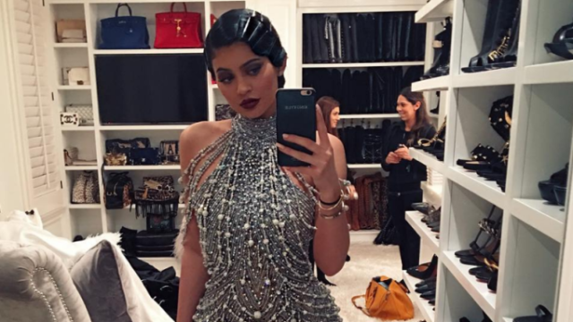 Kylie Jenner wearing a metallic 20s dress