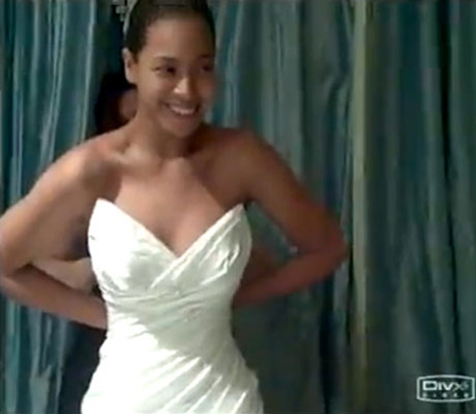 Beyonce Knowles trying on her wedding dress