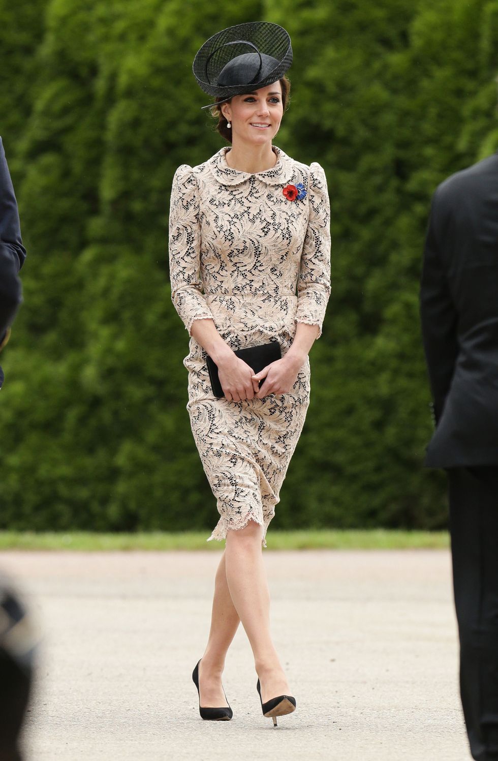 Kate Middleton wearing a cream and black lace dress