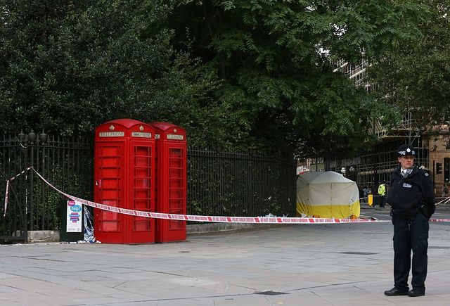 A woman has been knifed to death and five injured in an attack in London