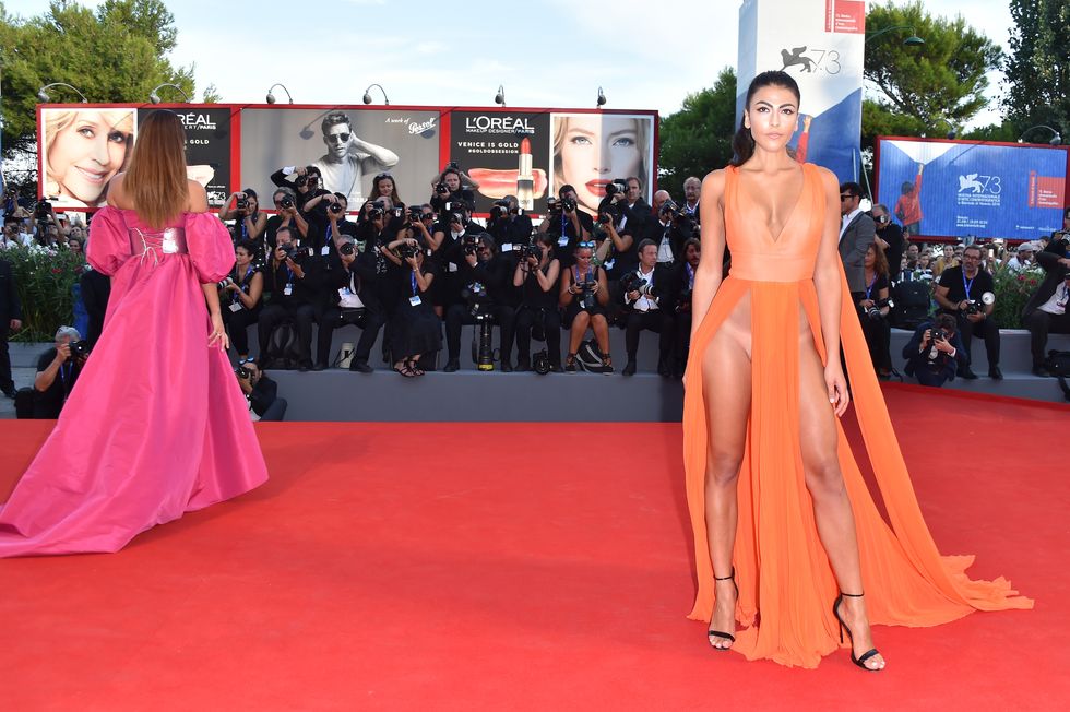 Venice Film Festival 2016: Italian models wearing midriff split dresses