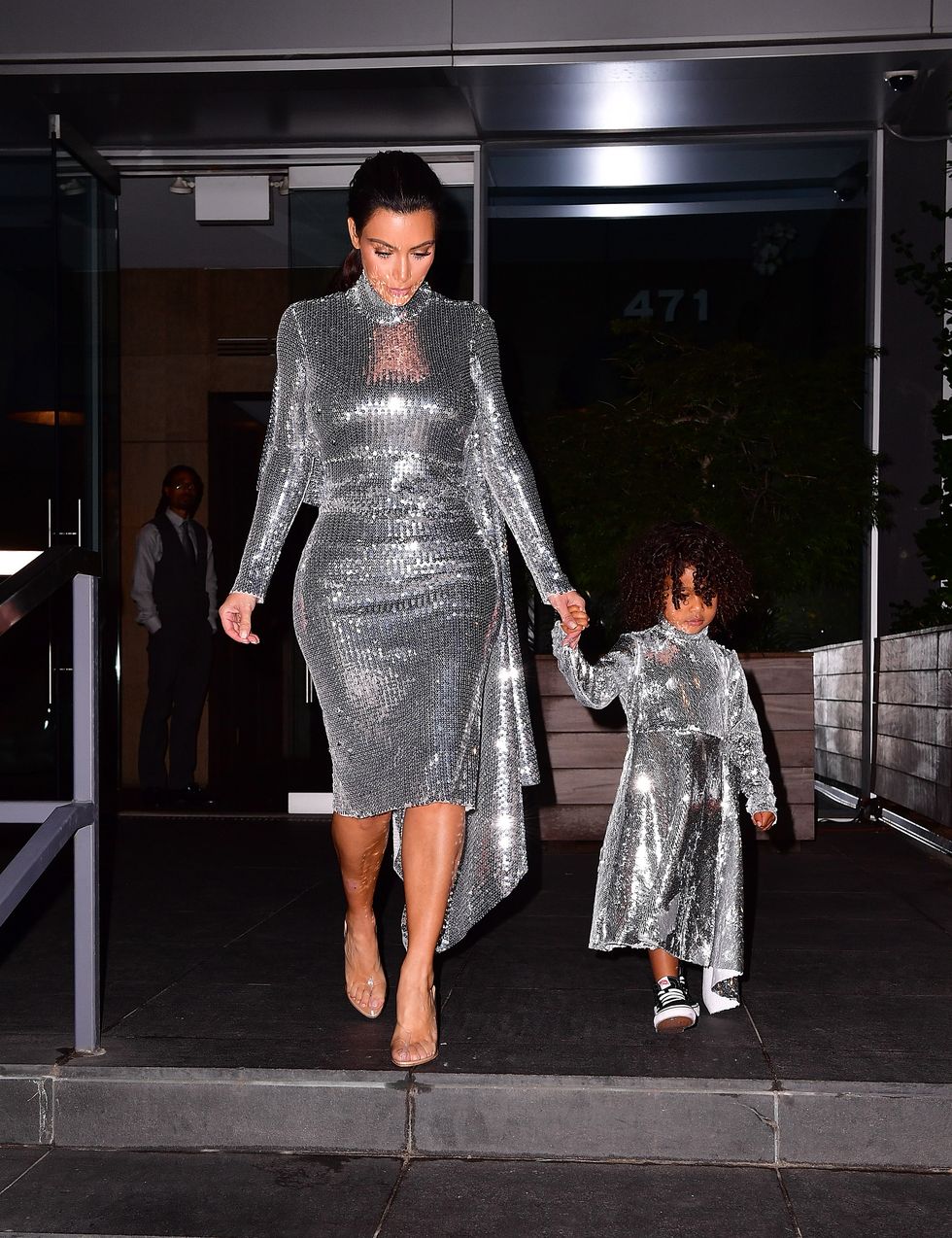 Kim Kardashian and North West wearing matching dresses