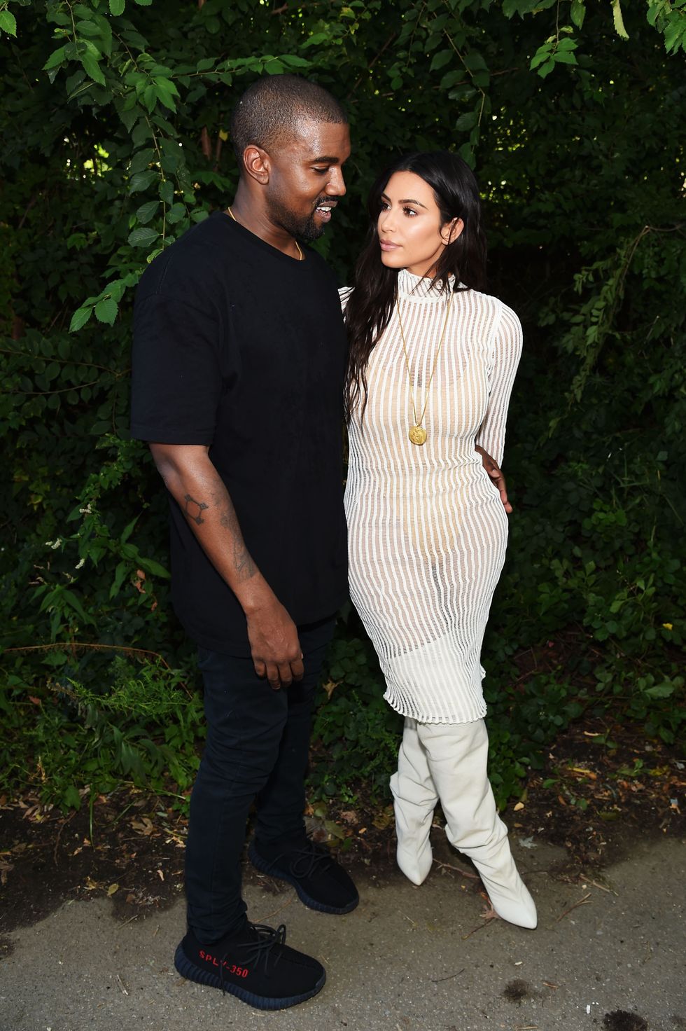 Kim Kardashian and Kanye West at Yeezy season 4