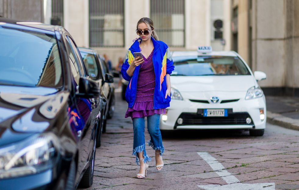 Fashion Week dress over jeans trend
