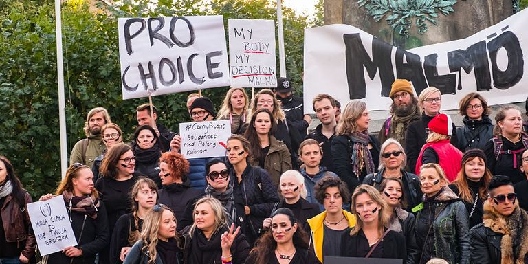Polish women ditch work and wear black to strike against proposed abortion ban