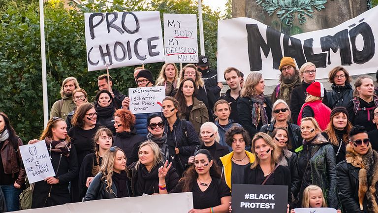 Polish women ditch work and wear black to strike against proposed abortion ban