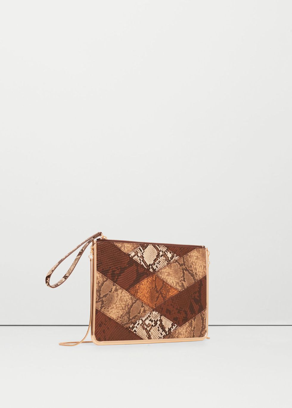<p>This clutch bag may look unassuming but it's oversized <em data-redactor-tag="em" data-verified="redactor">and</em> packs a pretty punch, too.</p><p><a href="http://shop.mango.com/GB/p0/woman/accessories/bags/crossbody-bags/snake-effect-zip-clutch?id=73005591_32&amp;n=1&amp;s=accesorios.bolsos" target="_blank">Snake-effect zip clutch, £19.99, Mango</a></p><p><em data-redactor-tag="em">Head in store and snap up any of these items by paying with your mobile thanks to&nbsp;<a class="body-el-link standard-body-el-link" href="https://www.visa.co.uk/visa-with-android-pay" target="_blank">Visa and Android Pay</a><sup data-redactor-tag="sup">TM.</sup><span class="redactor-invisible-space" data-verified="redactor" data-redactor-tag="span" data-redactor-class="redactor-invisible-space"></span>Just download the app, add your Visa card and make a purchase!</em><span class="redactor-invisible-space" data-verified="redactor" data-redactor-tag="span" data-redactor-class="redactor-invisible-space"></span><br></p><p><span class="redactor-invisible-space" data-verified="redactor" data-redactor-tag="span" data-redactor-class="redactor-invisible-space"><em data-redactor-tag="em"><em data-redactor-tag="em">Android Pay</em><em data-redactor-tag="em">&nbsp;is a trademark of Google Inc</em><span class="redactor-invisible-space" data-verified="redactor" data-redactor-tag="span" data-redactor-class="redactor-invisible-space"></span></em><span class="redactor-invisible-space" data-verified="redactor" data-redactor-tag="span" data-redactor-class="redactor-invisible-space"></span><br></span></p>