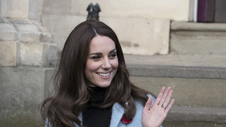 Kate Middleton wearing a pale blue coat