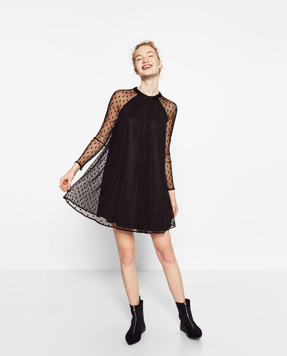 <p>This tulle mini is the perfect choice for ladies who love showing off a bit of leg. Wear with black boots like the model or add a heel for even more calf definition.</p><p><a href="http://www.zara.com/uk/en/woman/dresses/tulle-and-plumetis-dress-c269185p3971519.html" target="_blank">Tulle and plumetis dress, £29.99, Zara</a></p>