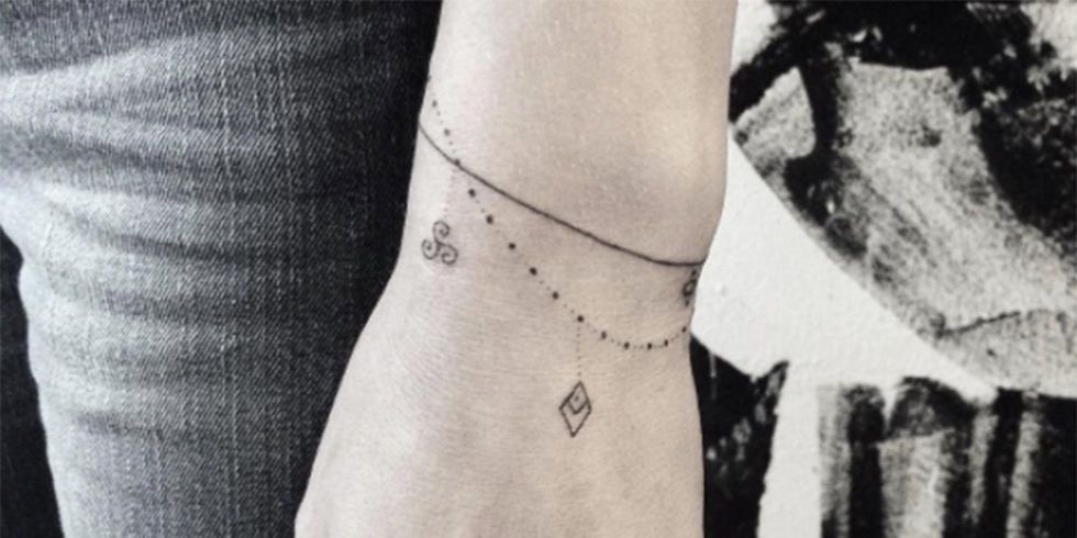 Bracelet Tattoos | Wrist bracelet tattoo, Bracelet tattoos with names, Tattoo  bracelet