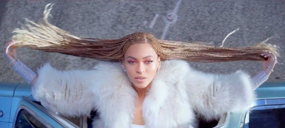 <p>When Beyoncé released "Formation," it became her very first video that specifically showcased a variety of black natural hairstyles. The French braids, afros, natural curls, box braids, and braided crown hairstyles worn in the video are an ode to black women everywhere because they've been worn in the community for decades. </p>