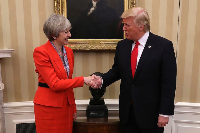 Donald Trump held Theresa May's hand and the internet can't cope