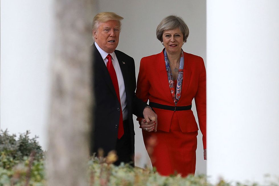 Donald Trump held Theresa May's hand and the internet can't cope