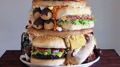 This fast food tower is actually a sweet sponge cake and we're confused AF