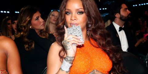 Rihanna and her jewel encrusted hip flask were living the best life at the Grammys