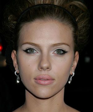<p><strong>Scarlett Johansson works the '60s look with pale lips and feline eyes</strong><br /></p><br /><ul><li>Pick a neutral tone that's just a few shades paler than your natural colour and opt for fleshy pink rather than beige. Try <strong>Mac lipstick in Classical, £11</strong> - it's very similar to Drew Barrymore's choice.<br /></li></ul><br />Photograph: Getty Images<br />