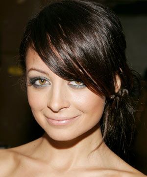<p> Nicole Richie's smouldering new look is complemented by kohl-rimmed, smoky eyes</p><ul><li>The best browns are bold blocks of bronze, mocha and chocolate, with a big helping of shine to make hair look luxurious. <strong>KERASTASE REFLEXION CREME CHROMA PROTECT, £15.50,</strong> will add gloss, pre-blow-dry. <br /></li></ul><br />Photograph: Getty Images<br /><p> </p>