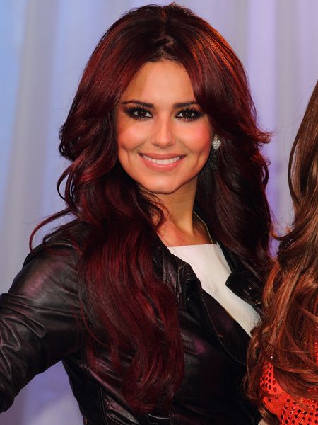 Cheryl has experimented with plum before, but this time her tresses seem to be taken with it. Her long, extension-heavy hair has been given an autumn/winter make-over proving berry hues are the colour code for this season