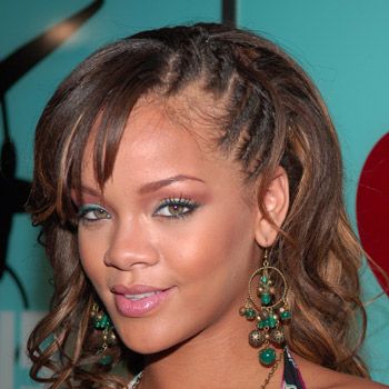 <p>With a loose wave, subtle highlights and a small braided section, Rihanna looks as though she's just walked straight off the beach with this super relaxed style</p>