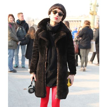 <p>Who wouldn't spot those neon tights? We love this sport luxe look, teaming brights with an oversized sweat and fur coat. Oh and not forgetting the matching pink lipstick</p>

