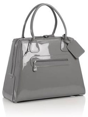 <p>Christine Bleakleyís a fan of M&Sí Aqua Patent Holdall and so are we! Big enough to cart around all our un-glam essentials but still super-smart</p><p>£89, <a href="M&S.com"target="_blank"> M&S.com </a></p>