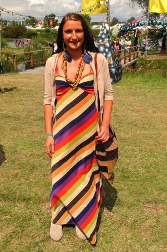 Working the maxidress at Secret Garden Party was Irene in this striped number by Apricot at New Look. We love her outsized feather earrings and wooden beads which originally belonged to her granny