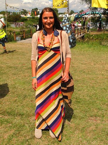 Working the maxidress at Secret Garden Party was Irene in this striped number by Apricot at New Look. We love her outsized feather earrings and wooden beads which originally belonged to her granny