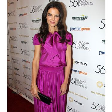 Katie Holmes manages to pull off fuchsia pink pleats without becoming an eyesore. How? Thanks to the fluid metallic silk material which flatters her frame giving her bags of confidence. Proof that looking like you’re wearing the pleats, not the other way around, is half the battle...