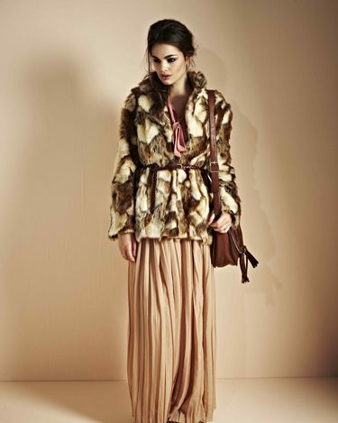 <p>If you're looking for an outfit that makes a statement add a fur jacket to your maxi skirt for cosy glamour</p><p>Lucy Maxi skirt £20, Sonia blouse £18, Santana saddle bag, £28</p><p><a href=" http://www.boohoo.com/new-in/lucy-all-over-pleated-chiffon-maxi-skirt/invt/azz72493">boohoo.com</a></p>
