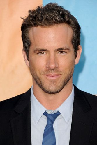 Ryan was looking delicious as he hit the red carpet for the premiere of his new flick “The Change-Up” in LA last night