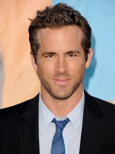 Ryan was looking delicious as he hit the red carpet for the premiere of his new flick “The Change-Up” in LA last night