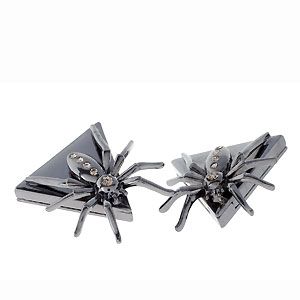 Spiders and Halloween go together like a witch and a broomstick, so why not add these bad boys to the collar of your crisp white shirt. Just wear with a long pleated skirt and a faux fur coat. Cosmo reckons if you're going to vamp it up, do it in style


<p>£10, <a href="http://www.asos.com">ASOS</a></p>