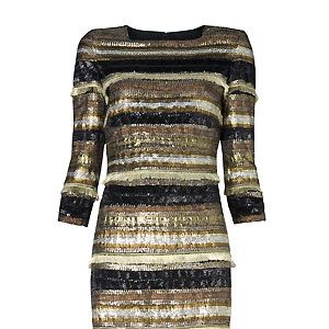 Oh Mango, what are you doing to us here at Cosmo? We need to shop for other people, but we can't when you're luring us with a delightful frock like this one. With its liquid gold shades and subtle shimmer, we're in metallic heaven
<p>£179, <a href="http://www.mango.com/">Mango</a></p>