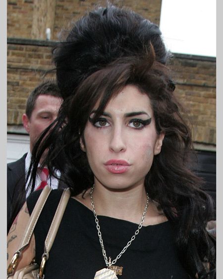 Amy's beehive and eyeliner horns have become symbols of modern rock chick. Her excessive hair on her miniscule frame accentuates her rebellious look granting her serious rock 'n' roll kudos.  <br />
