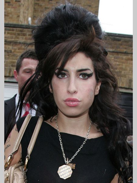 Amy's beehive and eyeliner horns have become symbols of modern rock chick. Her excessive hair on her miniscule frame accentuates her rebellious look granting her serious rock 'n' roll kudos.  <br />