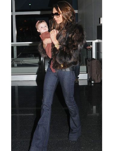 <p>Jeans are an easy staple come winter time, but sometimes they can look <i>too</i> casual when worn warming pieces. Be inspired by Victoria Beckham who glams up her dark winter denim with a luxe faux fur jacket – also managing to make a snug little nest for baby daughter Harper too!</p>
<p></p><a href="http://www.cosmopolitan.co.uk/fashion/shopping/cosy-cool-winter-fashion-knitwear">Shop cosy cool winter fashion</a>

