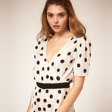 <p>Add a playful twist to your Christmas and New Year festivities with this super-cute, sequin polka dot playsuit. Wear with black tights to ward off winter chills, or save it for a house party and dare to bare!</p>
<p></p>Playsuit, £65, <a href="http://www.asos.com">asos.com</a>