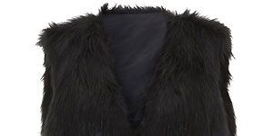 Give faux fur a formal edge by keeping your palette monochrome. Add a pussybow blouse and a sexy leather pencil skirt to your fabulous oversized black shaggy gilet. Purr-fection!
<p>£25, <a href="http://direct.asda.com/george/clothing/10,default,sc.html">George at ASDA</a></p>