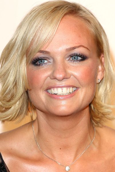 <p>The Spice Girl shortened her hair but lengthened her lashes and achieved some serious curl power</p>