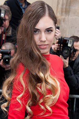 <p>Amber Le Bon looked absolutely stunning at the Christian Dior show at Paris Fashion Week. Apparently she gets frustrated with her modelling agency because she wants to try wacky hairstyles but they won't let her. Rubbish! We say the wackier the better. We love the ombre hair though – so cute!</p>