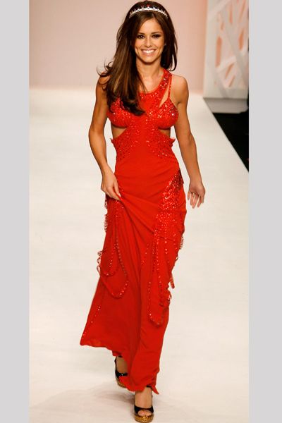 <p>The pop princess revelled on the Fashion For Relief runway in a revealing red dress and tiara </p>